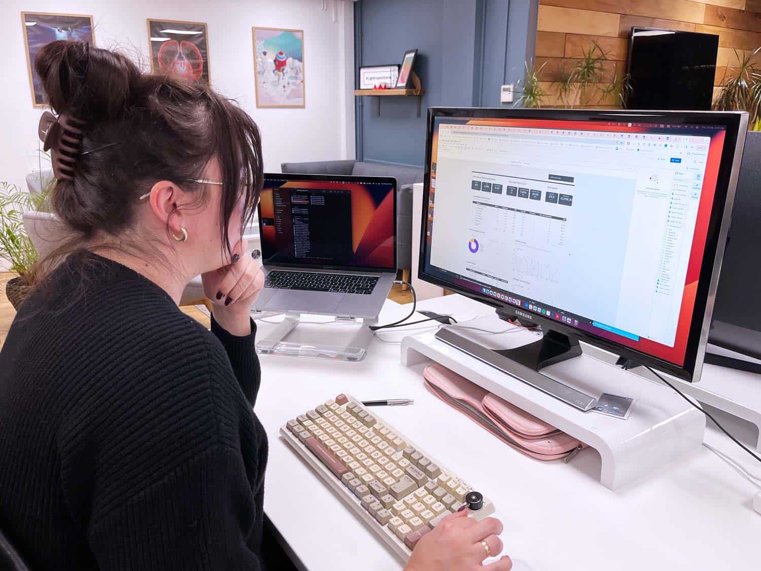  Sandra sat at her desk in the office